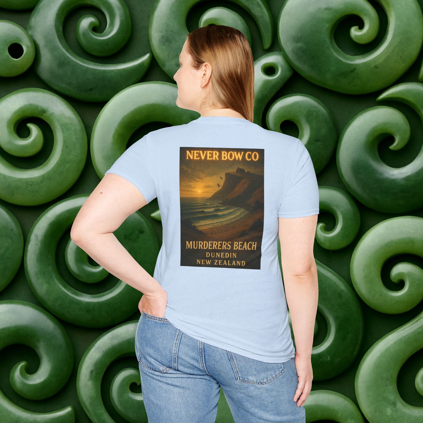 Never Bow Co. “Murderers Beach” Graphic Tee | Lightweight cotton tee honouring Murderers Beach — a symbol of defiance and spirit. Built for rebels and seekers of truth, it carries NZ legend in every thread.