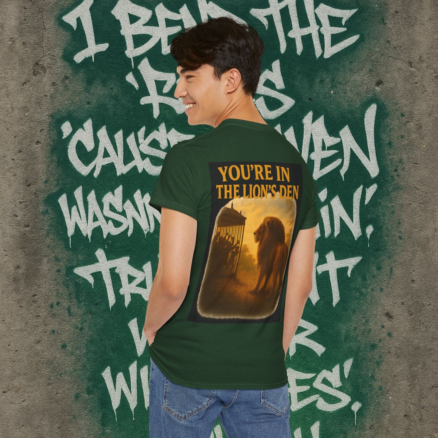 (Heavy Tee) Never Bow Co “You’re in the Lion’s Den” Graphic Streetwear Tee | Step into the Lion’s Den. Fearless statement piece built for warriors who refuse silence. Heavy cotton, bold graphic, courtroom grit. Wear strength, fight truth, and Never Bow.