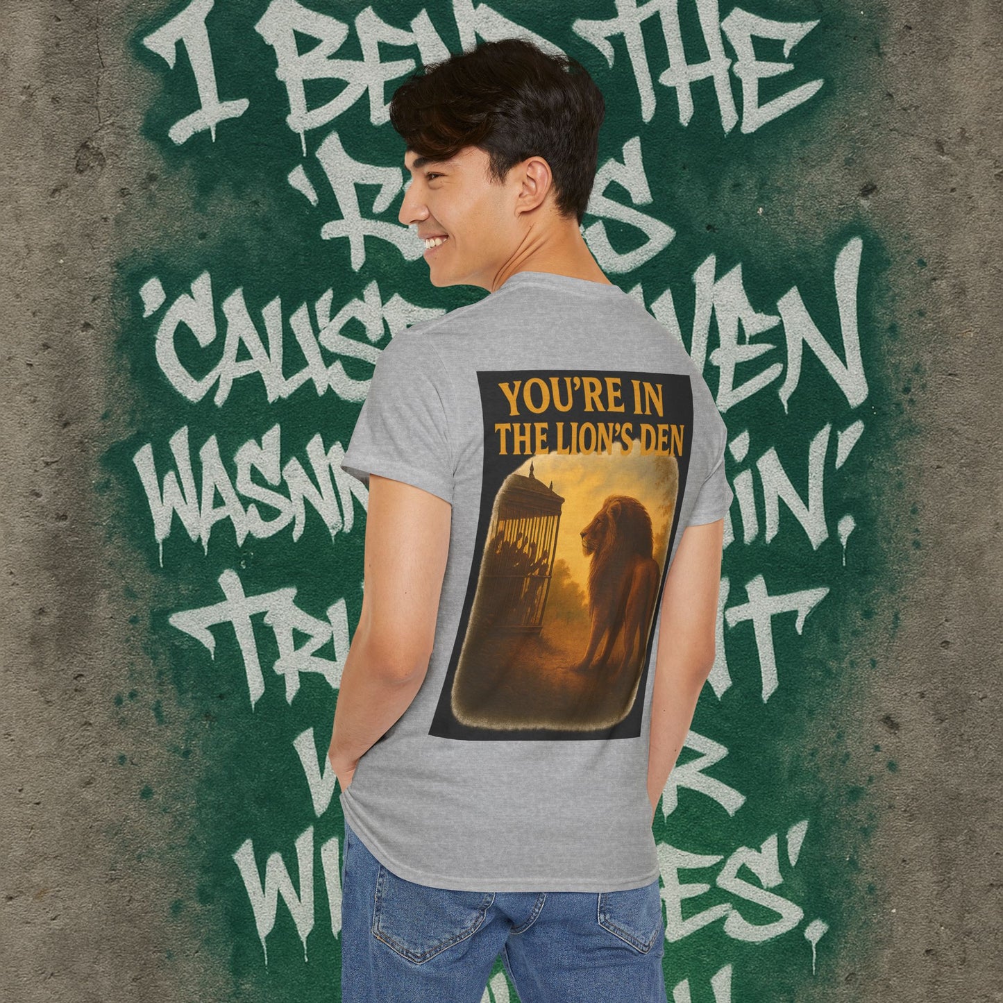 (Heavy Tee) Never Bow Co “You’re in the Lion’s Den” Graphic Streetwear Tee | Step into the Lion’s Den. Fearless statement piece built for warriors who refuse silence. Heavy cotton, bold graphic, courtroom grit. Wear strength, fight truth, and Never Bow.