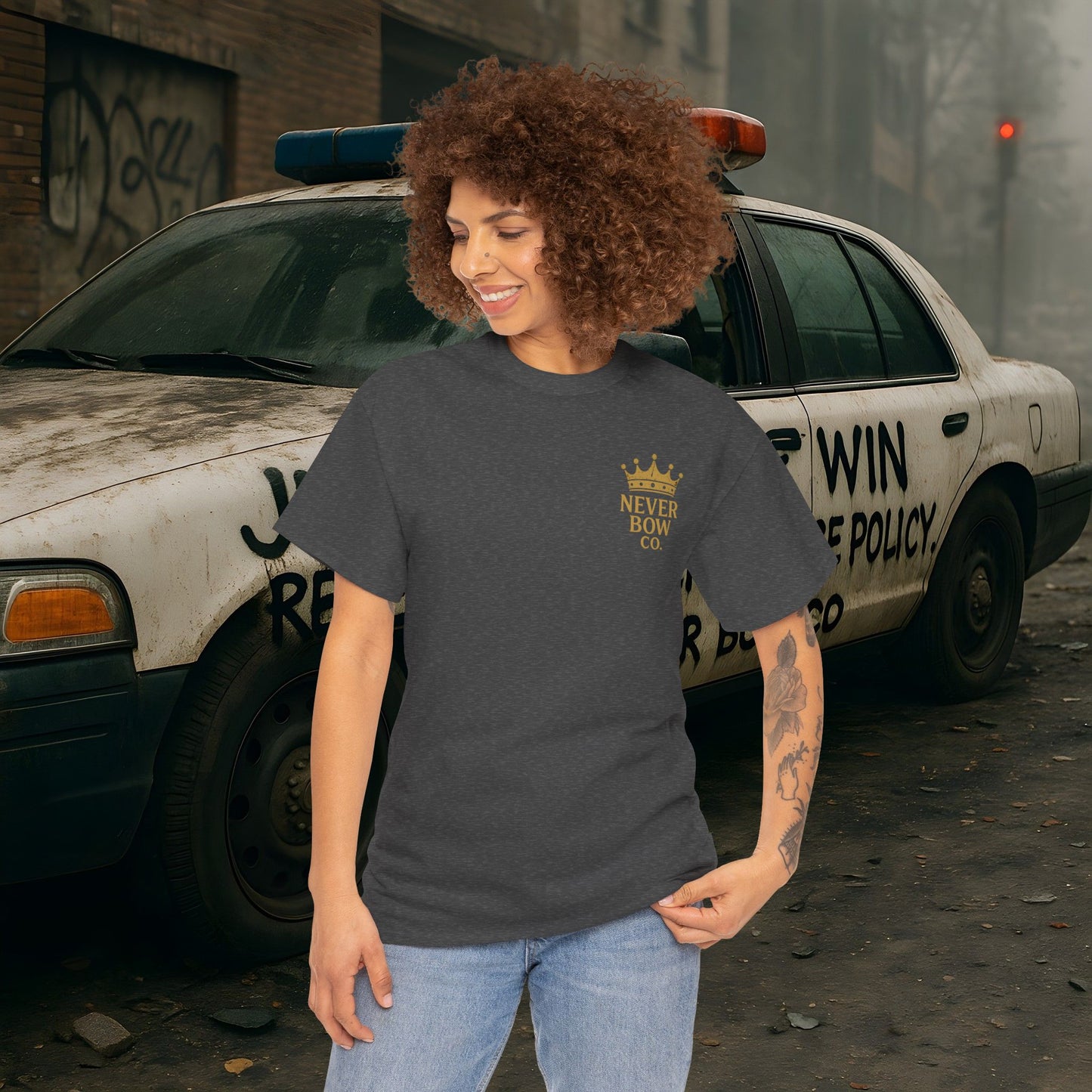 (Heavy Tee) Never Bow Co “Justice Will Be Heard” | Justice has a voice, and it roars from your back. Heavy cotton, bold print — a rebel’s declaration that truth echoes louder than lies. Wear it. Make them listen.