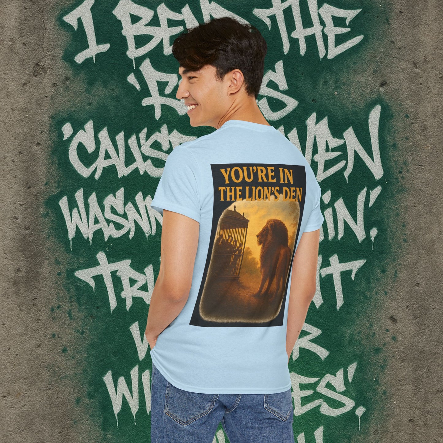 (Heavy Tee) Never Bow Co “You’re in the Lion’s Den” Graphic Streetwear Tee | Step into the Lion’s Den. Fearless statement piece built for warriors who refuse silence. Heavy cotton, bold graphic, courtroom grit. Wear strength, fight truth, and Never Bow.