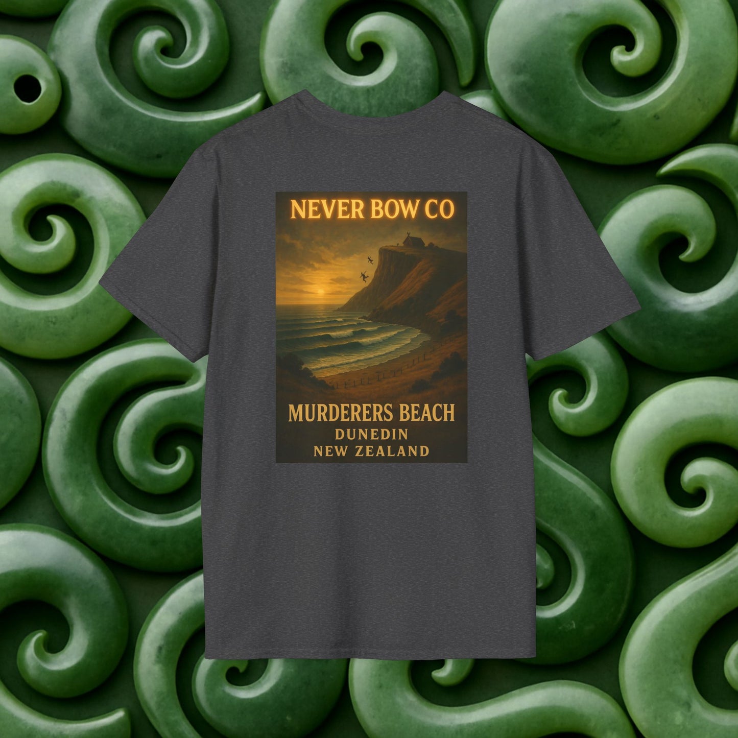 Never Bow Co. “Murderers Beach” Graphic Tee | Lightweight cotton tee honouring Murderers Beach — a symbol of defiance and spirit. Built for rebels and seekers of truth, it carries NZ legend in every thread.