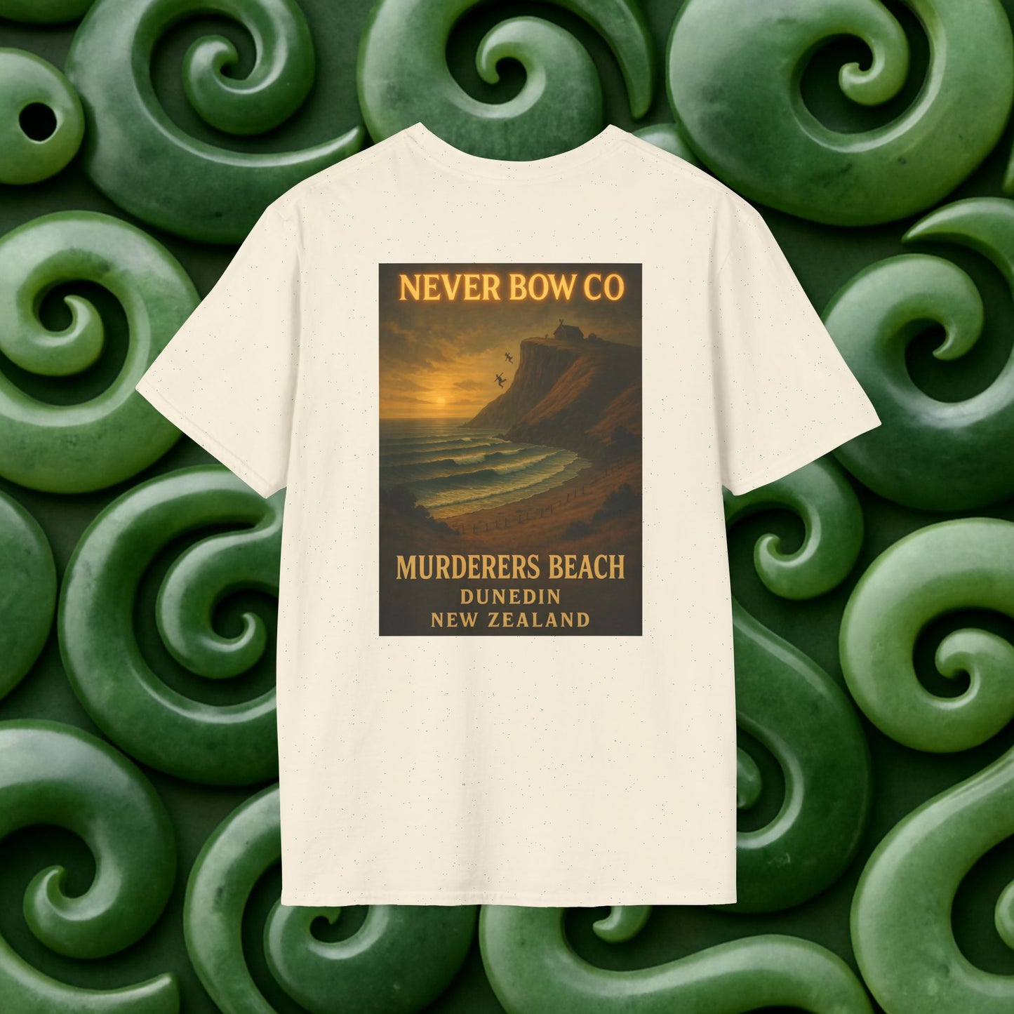 Never Bow Co. “Murderers Beach” Graphic Tee | Lightweight cotton tee honouring Murderers Beach — a symbol of defiance and spirit. Built for rebels and seekers of truth, it carries NZ legend in every thread.