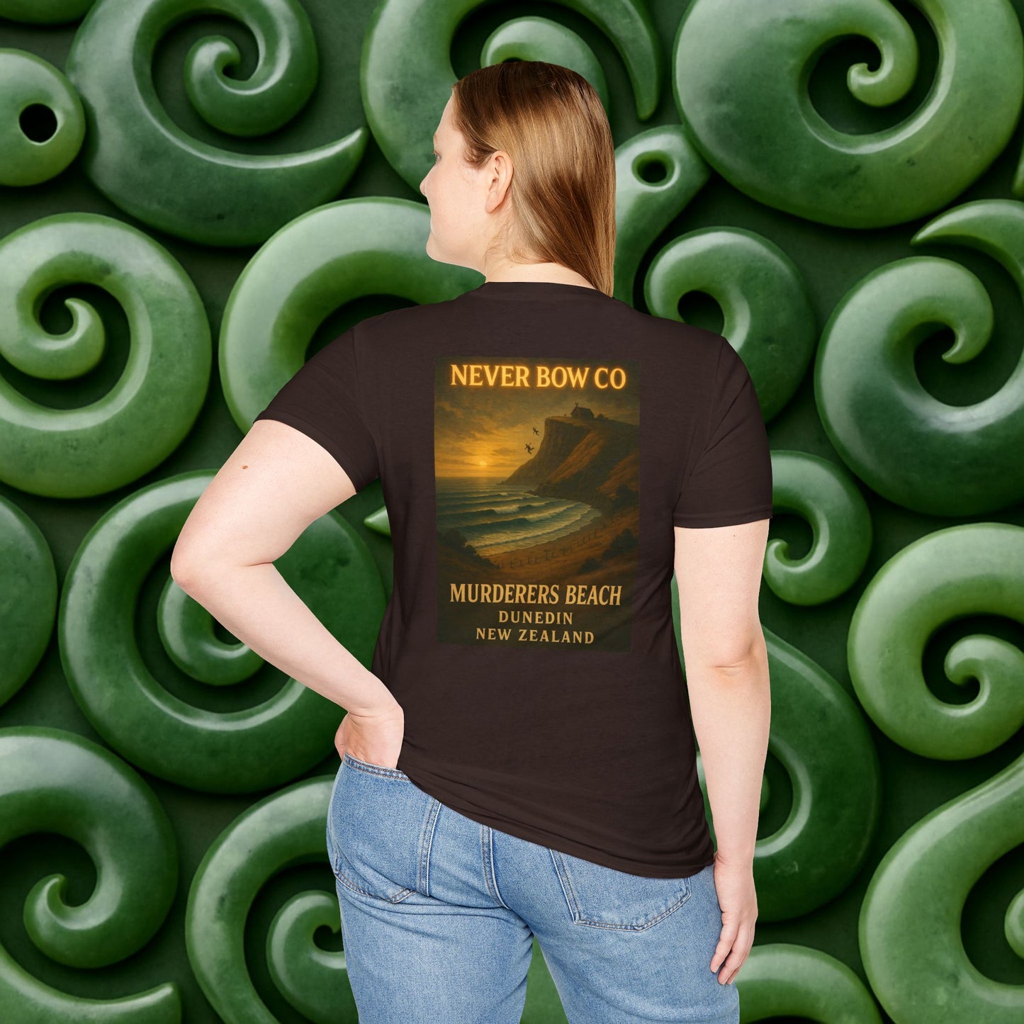 Never Bow Co. “Murderers Beach” Graphic Tee | Lightweight cotton tee honouring Murderers Beach — a symbol of defiance and spirit. Built for rebels and seekers of truth, it carries NZ legend in every thread.