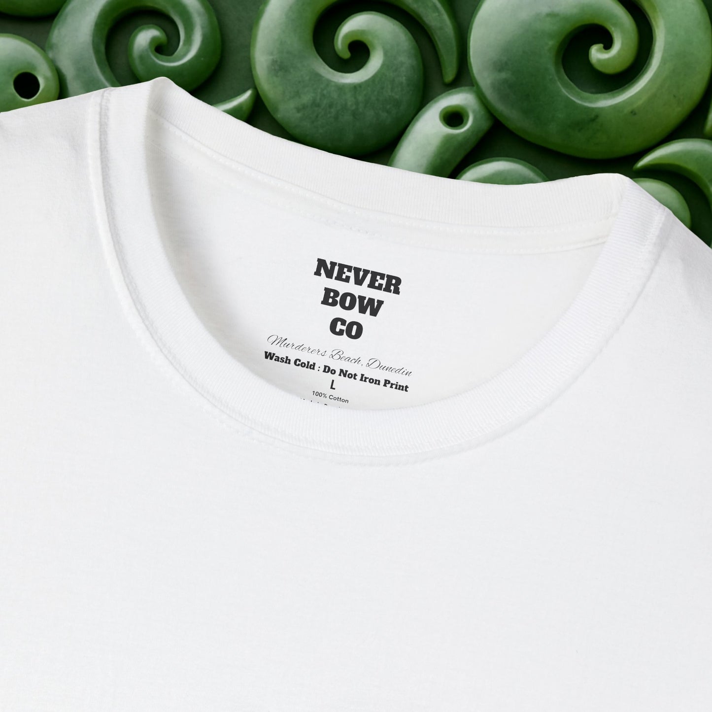 Never Bow Co. “Murderers Beach” Graphic Tee | Lightweight cotton tee honouring Murderers Beach — a symbol of defiance and spirit. Built for rebels and seekers of truth, it carries NZ legend in every thread.